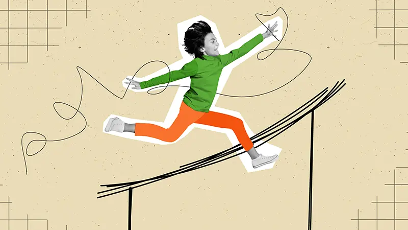 Barn som hoppar över hinder.