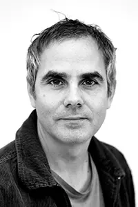 Svartvit ansiktsbild av Ann-Catrin Öberg.