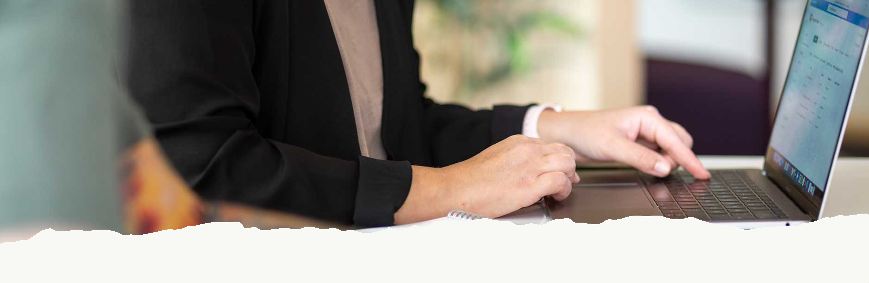 Two people at a computer